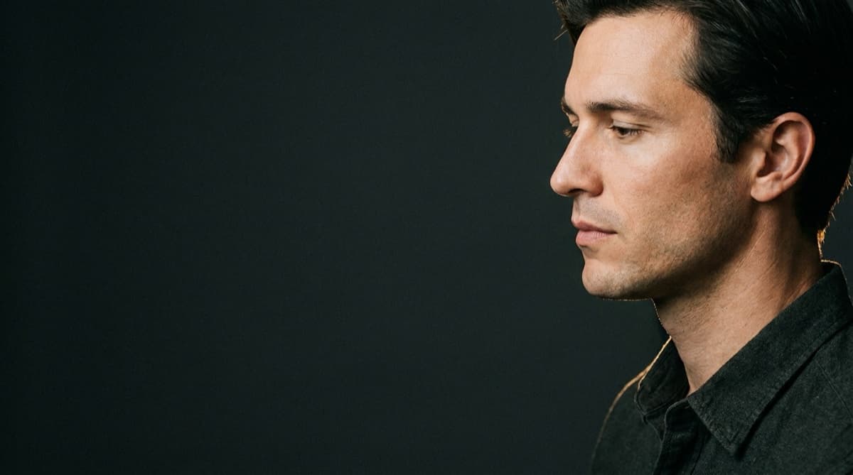Side-profile portrait showing facial structure and jawline